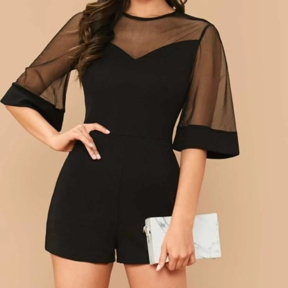Pants - Hot black romper with sheer detailing brand new